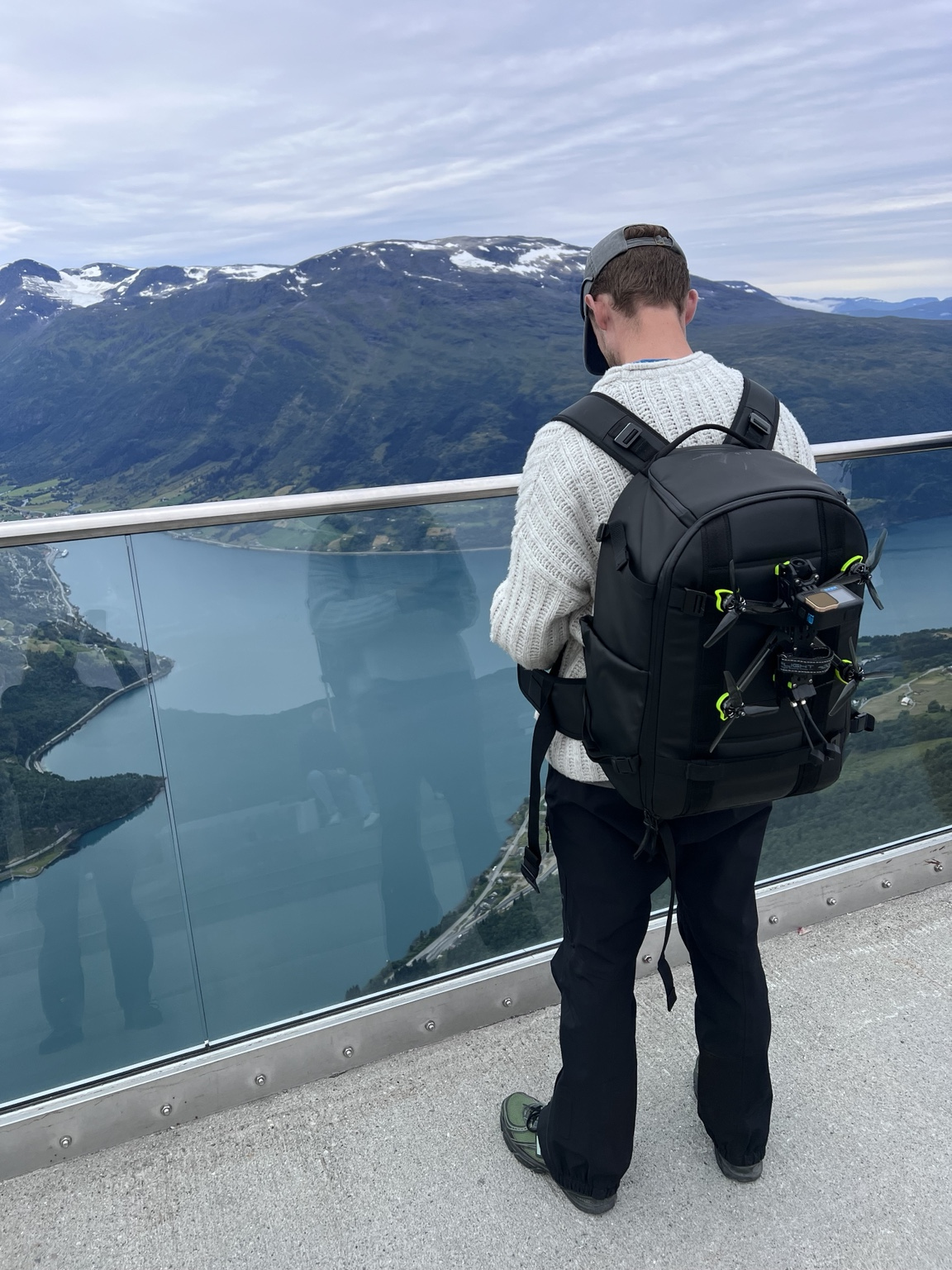 Andreas Holst outdoors with a fjord view